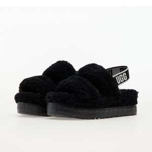 Ugg black platform slippers. Barely worn. Size 8!!